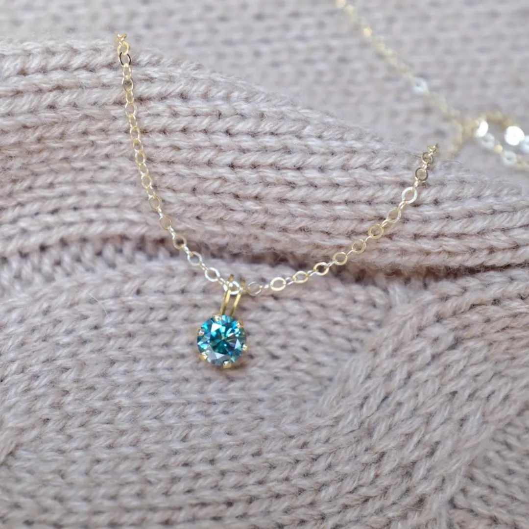 /public/photos/live/Delicate Round Cut Dark Green Moissanite Pendant   767 (4).webp